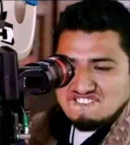 guy looking real pervy through a camera