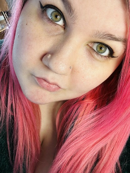 another selfie n my eyes are very green but also there's kinda like a yellow burst in the middle like a frickin sunflower