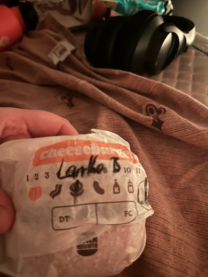 cheeseburger wrapper says Lanthe B