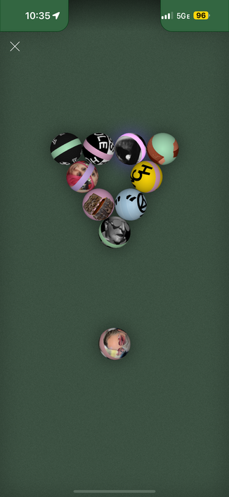 pool table set up with the pfps of various accounts I follow on the balls