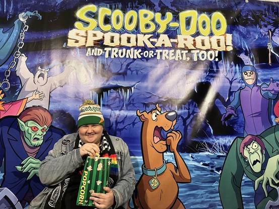 me with a perfectly circular goddamn head in my Gabagool hat eating popcorn in front of a big backdrop for the Scooby-Doo Spook-a-Roo! 