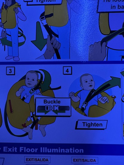 plane back safety card illustrations with a very incredulous baby in a flotation device 