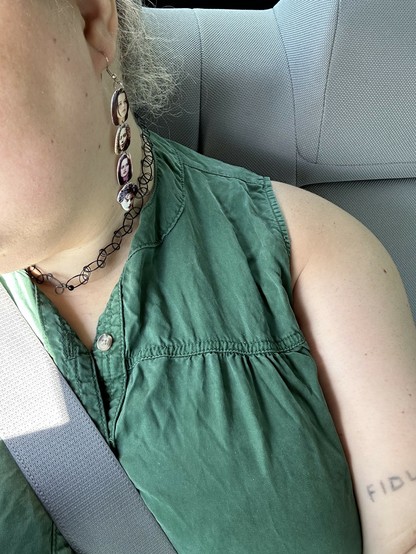 earrings with pictures of the cast of the movie The Craft