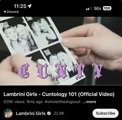 still from the music video for Cuntology 101 by Lambrini Girls showing a black and white photo booth printout from Rough Trade in London