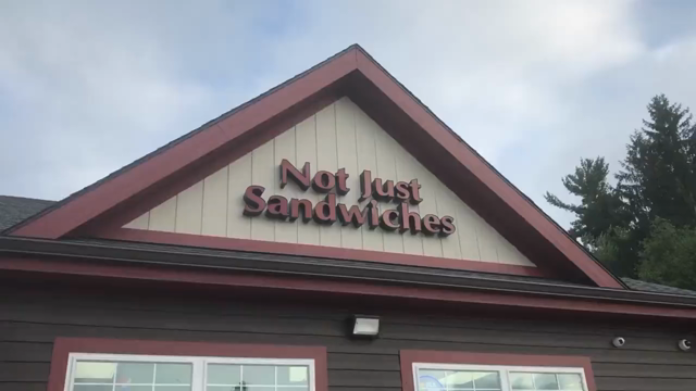 a store called not just sandwiches. pan to the door to find out they also sell WORMS