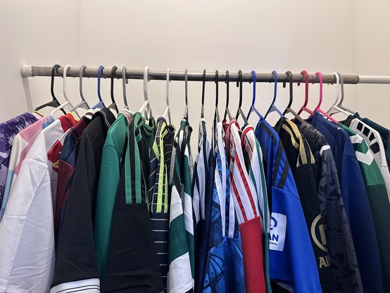 20 football shirts hanging in my closet