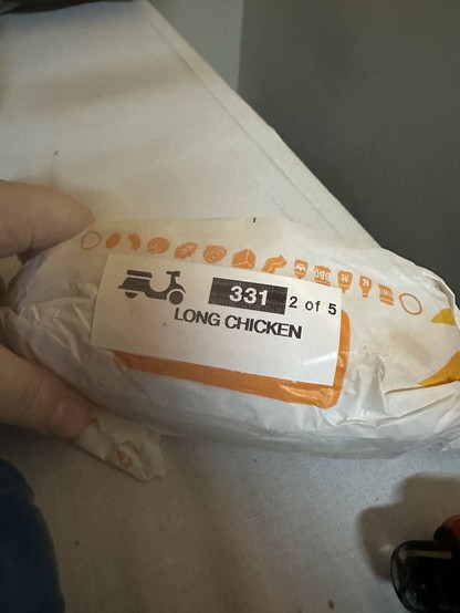 burger King sandwich labeled LONG CHICKEN which is a sandwich they sell at Spanish burger king