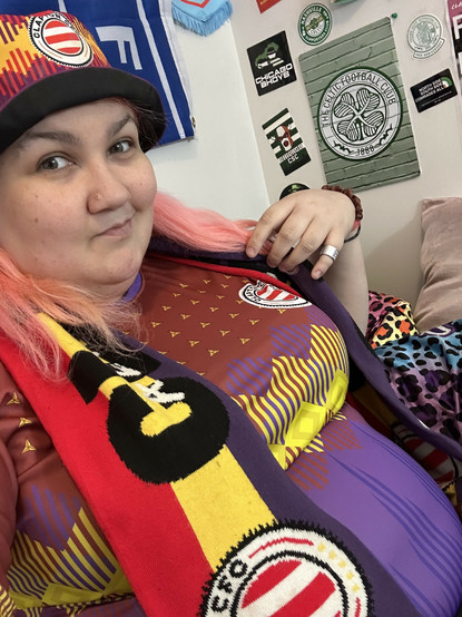 me in my Clapton CFC away kit in the colors of the second Spanish republic as well as a matching clapton scarf and bucket hat