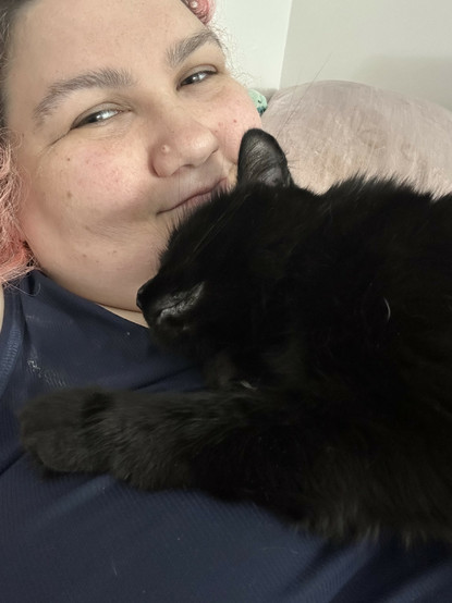 my cat giving me a lil hug