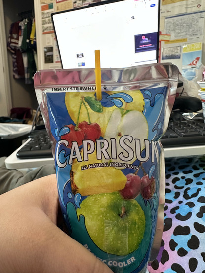 capri sun where the straw hole is a little bit too far to the left