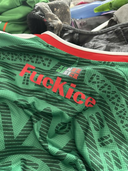 back of my Mexico kit with a fuck ice decal under the neckline. it's the same shade of red as the collar which is nifty